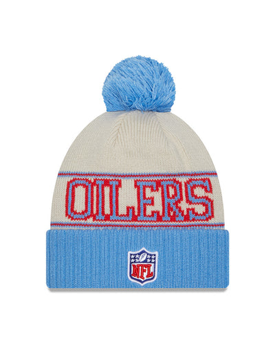 Houston Oilers New Era 2023 Sideline Historic Pom Cuffed Knit Hat - Cream/Baby Blue - Pro League Sports Collectibles Inc.