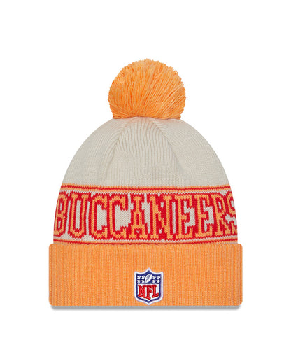 Tampa Bay Buccaneers New Era 2023 Sideline Historic Pom Cuffed Knit Hat - Cream/Yellow - Pro League Sports Collectibles Inc.