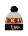 Cincinnati Bengals New Era 2023 Sideline Historic Pom Cuffed Knit Hat - Cream/Browns - Pro League Sports Collectibles Inc.