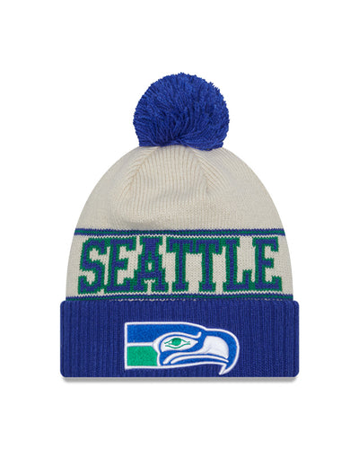 Seattle Seahawks New Era 2023 Sideline Historic Pom Cuffed Knit Hat - Cream/Blue - Pro League Sports Collectibles Inc.