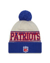 New England Patriots New Era 2023 Sideline Historic Pom Cuffed Knit Hat - Cream/Blue - Pro League Sports Collectibles Inc.