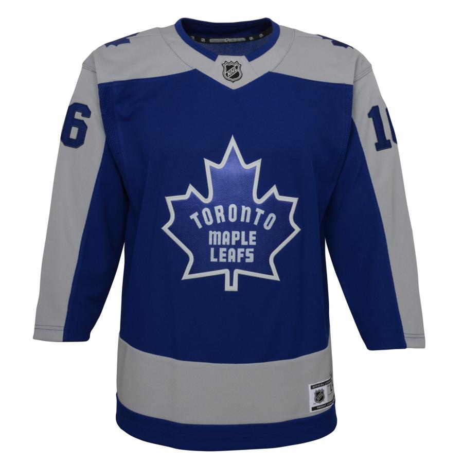 Wearing the reverse retro jersey, Mitchell Marner of the Toronto
