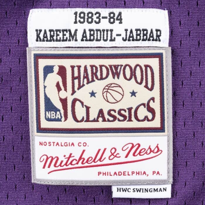 Kareem Abdul-Jabbar Los Angeles Lakers Mitchell & Ness 1983-84 Hardwood Classic Swingman Purple Jersey - Pro League Sports Collectibles Inc.