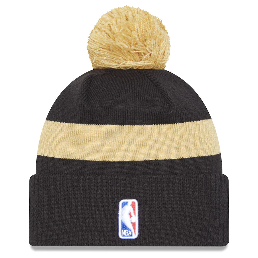 Youth Toronto Raptors New Era Black and Gold City Edition 2022-23 Pom Knit Toque - Pro League Sports Collectibles Inc.