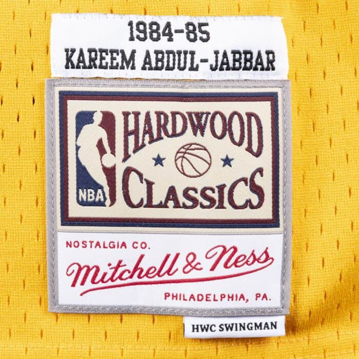 Kareem Abdul-Jabbar Los Angeles Lakers Mitchell & Ness 1984-85 Hardwood Classic Swingman Gold Jersey - Pro League Sports Collectibles Inc.