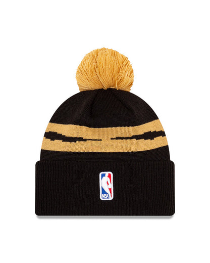 Toronto Raptors New Era Black and Gold City Series 20 Pom Knit Toque - Pro League Sports Collectibles Inc.