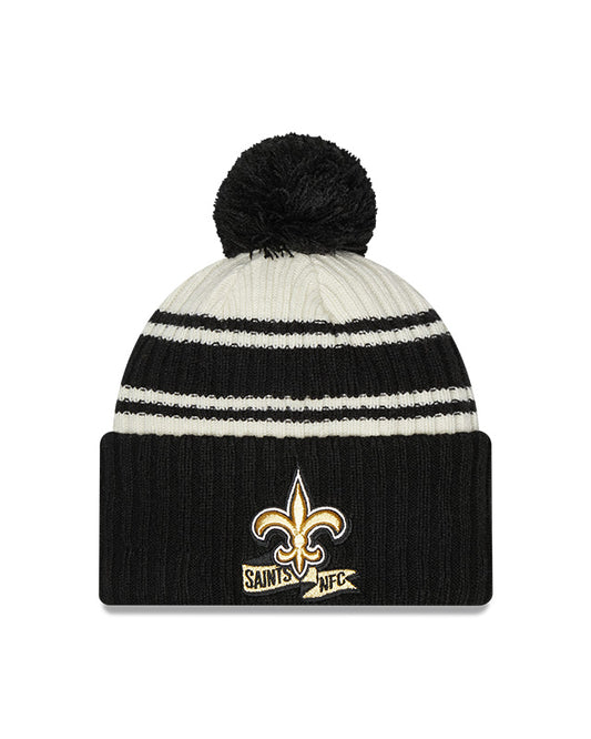 New Orleans Saints New Era 2022 Sideline - Sport Cuffed Pom Knit Hat - Cream/Black - Pro League Sports Collectibles Inc.